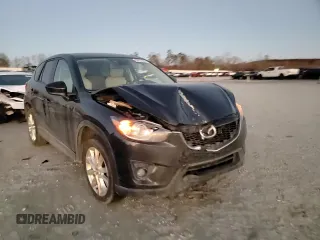 2014 Mazda CX-5 Grand Touring with VIN JM3KE4DY9E0366667, listed as a Copart auction lot 88707365 with 140,115 mi miles and Salvage Title. Bid and sale history available at carsss.com. Image 11.