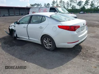 2013 Kia Optima LX z VIN KNAGM4A79D5312328, wystawiony jako IAAI lot #42356029 z przebiegiem 194 562 mil mil oraz . Historia ofert i sprzedaży dostępna na DreamBid. Obrazek 3.