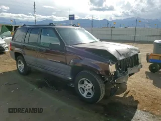 1997 Jeep Grand Cherokee Laredo with VIN 1J4GZ58S1VC747713, listed as a Copart auction lot 55290275 with 159,846 mi miles and Salvage title. Bid and sale history available at DreamBid. Image 13.