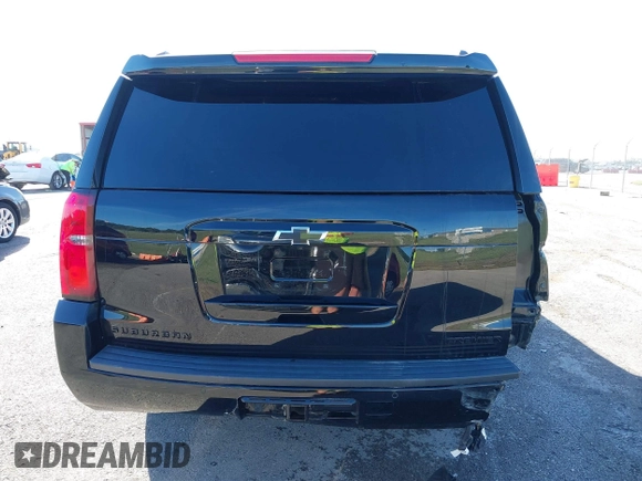 2019 Chevrolet Suburban Premier with VIN 1GNSKJKJ1KR100936, listed as a IAAI auction lot 40489121 with 97,884 mi miles and . Bid and sale history available at DreamBid. Image 17.