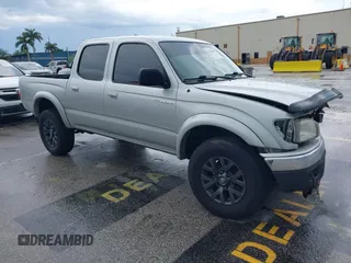 2003 Toyota Tacoma PreRunner z VIN 5TEGN92N13Z295384, wystawiony jako IAAI lot #42406105 z przebiegiem 194 171 mil mil oraz . Historia ofert i sprzedaży dostępna na DreamBid. Obrazek 1.