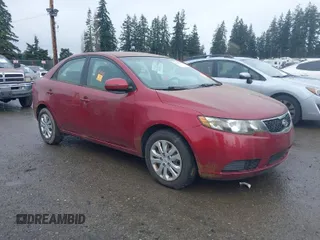2011 Kia Forte EX with VIN KNAFU4A24B5452963, listed as a IAAI auction lot 41925159 with 90,963 mi miles. Bid and sale history available at carsss.com. Image 1.