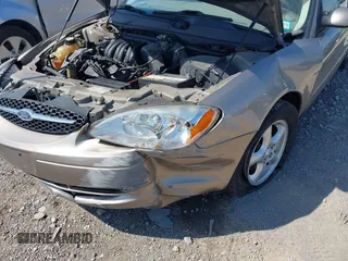 2003 Ford Taurus SE Standard with VIN 1FAFP53U73A245044, listed as a IAAI auction lot 41999582 with 85,870 mi miles. Bid and sale history available at carsss.com. Image 6.