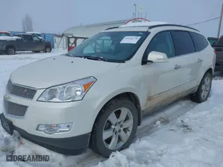 2012 Chevrolet Traverse LTZ with VIN 1GNKVLED6CJ289589, listed as a IAAI auction lot 41226374 with 122,515 mi miles. Bid and sale history available at carsss.com. Image 2.