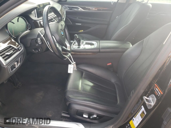 2018 BMW 7 Series 740i xDrive with VIN WBA7E4C5XJGV24003, listed as a Copart auction lot 71395443 with 63,558 mi miles. Bid and sale history available at carsss.com. Image 7.