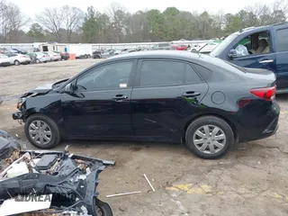 2023 Kia Rio S with VIN 3KPA24AD5PE560704, listed as a IAAI auction lot 41546929 with 51,114 mi miles. Bid and sale history available at carsss.com. Image 14.