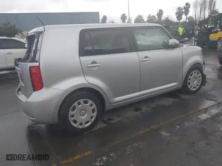 2010 Scion xB with VIN JTLZE4FE9A1110922, listed as a IAAI auction lot 41761378 with 89,000 mi miles. Bid and sale history available at carsss.com. Image 4.