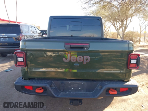 2021 Jeep Gladiator Mojave with VIN 1C6JJTEG8ML606876, listed as a IAAI auction lot 41632052 with 30,255 mi miles and . Bid and sale history available at DreamBid. Image 16.