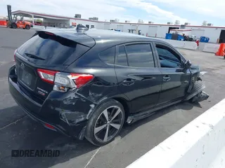 2017 Subaru Impreza Special Sports with VIN 4S3GTAK63H3710338, listed as a IAAI auction lot 41907585 with 99,338 mi miles and . Bid and sale history available at DreamBid. Image 4.