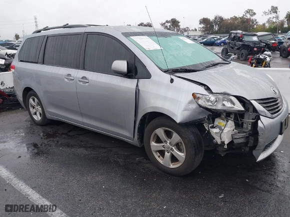 2014 Toyota Sienna LE AAS with VIN 5TDKK3DC1ES488954, listed as a IAAI auction lot 41557423 with 144,031 mi miles. Bid and sale history available at carsss.com. Image 1.