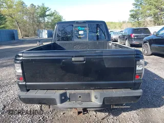 2011 Ford Ranger XLT with VIN 1FTLR4FE9BPB07796, listed as a IAAI auction lot 42128597 with 235,512 mi miles. Bid and sale history available at carsss.com. Image 17.