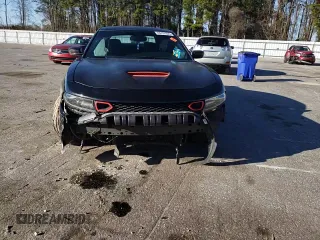 2018 Dodge Charger Daytona with VIN 2C3CDXCT4JH283018, listed as a Copart auction lot 48707905 with 121,624 mi miles and Salvage title. Bid and sale history available at DreamBid. Image 10.