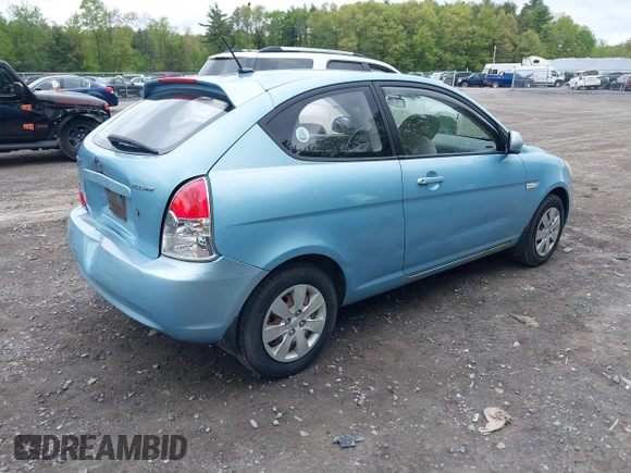 2010 Hyundai Accent GS with VIN KMHCM3AC2AU180440, listed as a IAAI auction lot 42156900 with 114,984 mi miles and . Bid and sale history available at DreamBid. Image 4.