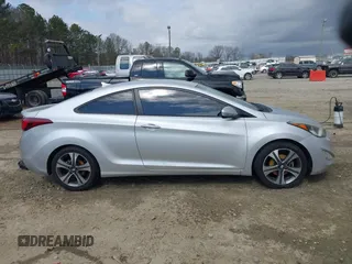 2014 Hyundai Elantra z VIN KMHDH6AH3EU026718, wystawiony jako IAAI lot #41721610 z przebiegiem 109 338 mil mil oraz . Historia ofert i sprzedaży dostępna na DreamBid. Obrazek 14.