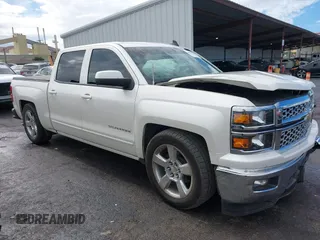 2015 Chevrolet Silverado 1500 LT with VIN 3GCPCREC2FG147373, listed as a IAAI auction lot 40613376 with 102,521 mi miles and . Bid and sale history available at DreamBid. Image 1.