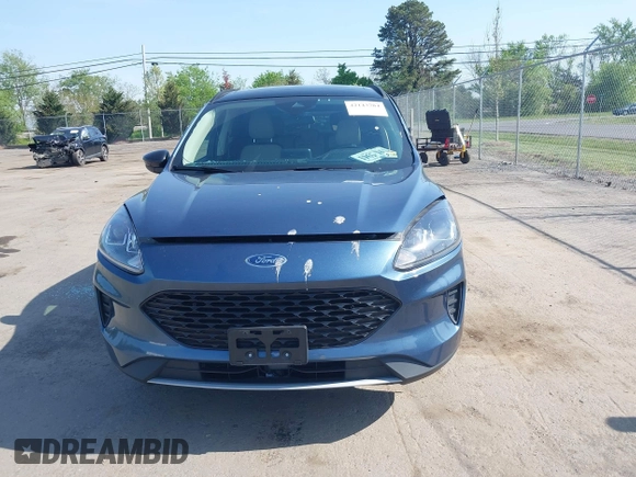 2020 Ford Escape SE Sport Hybrid with VIN 1FMCU9BZ6LUC38008, listed as a IAAI auction lot 42143784 with 81,804 mi miles and . Bid and sale history available at DreamBid. Image 12.