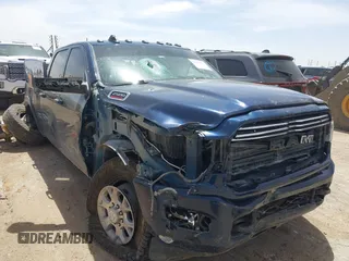 2022 Ram 2500 Laramie with VIN 3C6UR5FL1NG372673, listed as a IAAI auction lot 42247122 with 66,216 mi miles and . Bid and sale history available at DreamBid. Image 1.