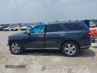 2014 Dodge Durango SXT with VIN 1C4RDHAG3EC560851, listed as a IAAI auction lot 42282572 with Not provided miles and . Bid and sale history available at DreamBid. Image 15.