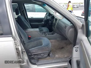 2003 Ford Explorer XLT z VIN 1FMZU73K63ZA39687, wystawiony jako IAAI lot #42647178 z przebiegiem 244 338 mil mil oraz . Historia ofert i sprzedaży dostępna na DreamBid. Obrazek 5.