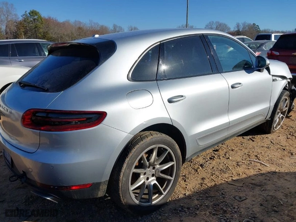2018 Porsche Macan with VIN WP1AA2A50JLB09807, listed as a IAAI auction lot 41634432 with 74,357 mi miles. Bid and sale history available at carsss.com. Image 4.
