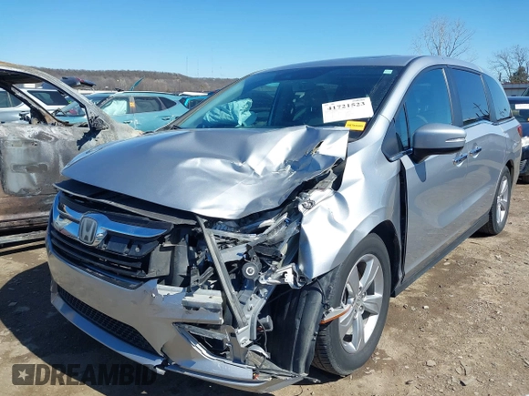 2018 Honda Odyssey EX-L with VIN 5FNRL6H71JB077112, listed as a IAAI auction lot 41721523 with 70,893 mi miles. Bid and sale history available at carsss.com. Image 6.