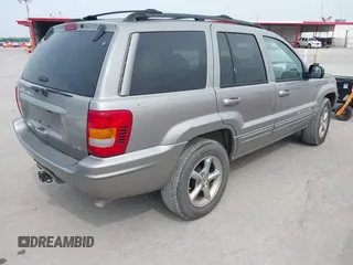 2001 Jeep Grand Cherokee Limited with VIN 1J4GW58N21C655426, listed as a IAAI auction lot 42280177 with 110,207 mi miles and . Bid and sale history available at DreamBid. Image 4.