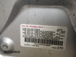 2010 Mitsubishi Outlander XLS z VIN JA4JT4AX9AZ002688, wystawiony jako Copart lot #51173605 z przebiegiem 162 147 mil mil oraz Szkoda całkowita • Salvage title. Historia ofert i sprzedaży dostępna na DreamBid. Obrazek 13.