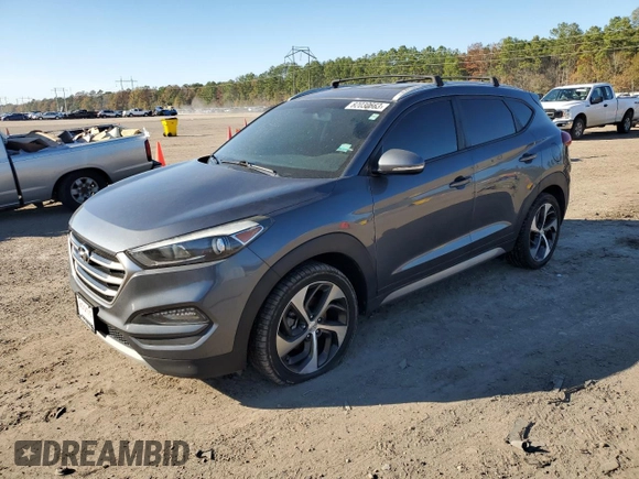 2017 Hyundai Tucson Sport z VIN KM8J33A26HU326088, wystawiony jako Copart lot #82030663 z przebiegiem 111 615 mil mil oraz Czysty tytuł • Clean title. Historia ofert i sprzedaży dostępna na DreamBid. Obrazek 1.