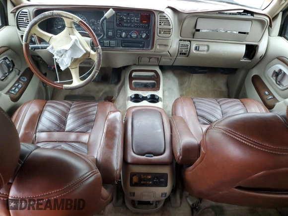 2000 Cadillac Escalade z VIN 1GYEK63R9YR218680, wystawiony jako Copart lot #87393204 z przebiegiem 295 494 mil mil oraz Szkoda całkowita • Salvage title. Historia ofert i sprzedaży dostępna na DreamBid. Obrazek 8.