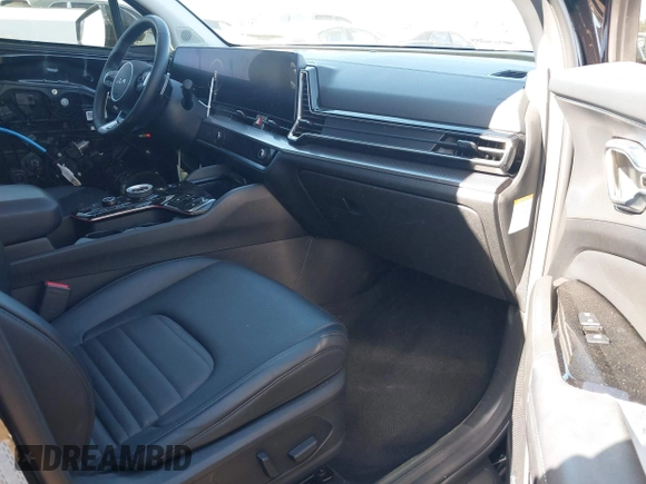 2023 Kia Sportage SX-Prestige with VIN KNDPXCAGXP7035895, listed as a IAAI auction lot 41335448 with 74,272 mi miles and . Bid and sale history available at DreamBid. Image 5.