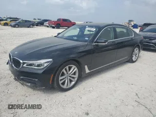 2016 BMW 7 Series 750i xDrive z VIN WBA7F2C56GG416424, wystawiony jako Copart lot #51935815 z przebiegiem 84 828 mil mil oraz Szkoda całkowita • Salvage title. Historia ofert i sprzedaży dostępna na DreamBid. Obrazek 1.