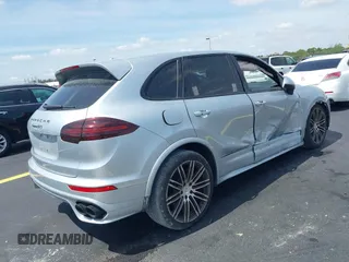 2016 Porsche Cayenne GTS z VIN WP1AD2A27GLA76018, wystawiony jako IAAI lot #42209515 z przebiegiem 49 432 mil mil oraz . Historia ofert i sprzedaży dostępna na DreamBid. Obrazek 4.