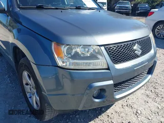 2006 Suzuki Grand Vitara Premium z VIN JS3TD943064100693, wystawiony jako IAAI lot #41772479 z przebiegiem 135 901 mil mil oraz . Historia ofert i sprzedaży dostępna na DreamBid. Obrazek 15.