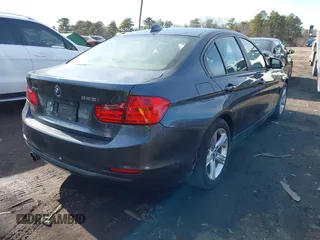 2013 BMW 3 Series 328i xDrive with VIN WBA3B3G58DNR79587, listed as a IAAI auction lot 41494987 with 115,336 mi miles. Bid and sale history available at carsss.com. Image 4.