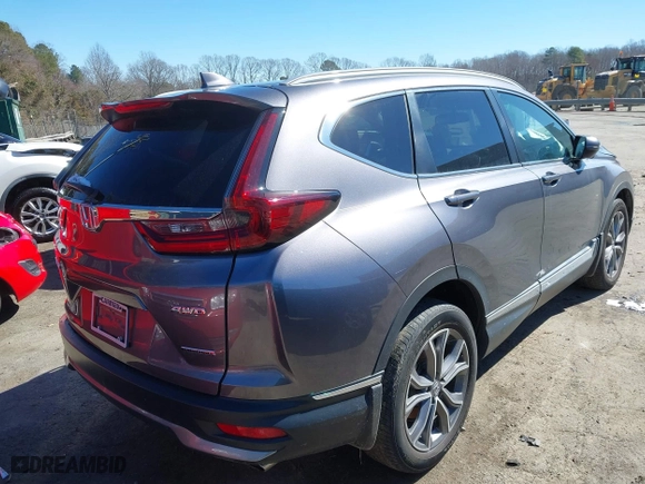 2021 Honda CR-V Touring with VIN 7FARW2H9XME012480, listed as a IAAI auction lot 41632487 with 59,684 mi miles. Bid and sale history available at carsss.com. Image 4.