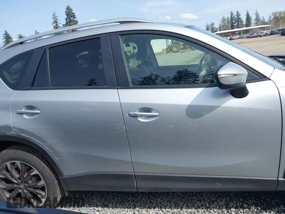 2016 Mazda CX-5 Grand Touring with VIN JM3KE4DYXG0647802, listed as a IAAI auction lot 41996854 with 85,774 mi miles. Bid and sale history available at carsss.com. Image 13.