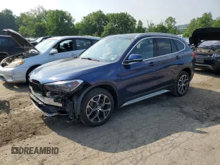 2020 BMW X1 xDrive28i z VIN WBXJG9C01L5P38237, wystawiony jako Copart lot #60621605 z przebiegiem 39 359 mil mil oraz Szkoda całkowita • Salvage title. Historia ofert i sprzedaży dostępna na DreamBid. Obrazek 1.
