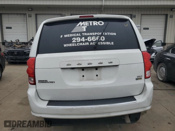 2019 Dodge Grand Caravan SXT with VIN 2C7WDGCG5KR584228, listed as a Copart auction lot 88709775 with 150,581 mi miles and Salvage Title. Bid and sale history available at DreamBid. Image 7.