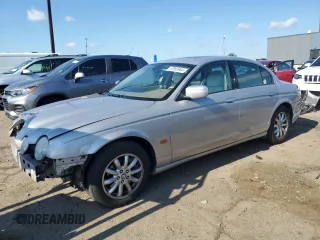 2002 Jaguar S-Type with VIN SAJDA01P52GM27504, listed as a Copart auction lot 57850944 with 119,707 mi miles and Clean Title. Bid and sale history available at DreamBid. Image 1.