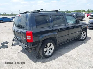 2014 Jeep Patriot Latitude with VIN 1C4NJPFA4ED604145, listed as a IAAI auction lot 42091619 with 81,119 mi miles and . Bid and sale history available at carsss.com. Image 4.