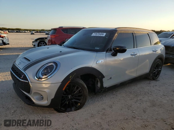 2023 MINI Clubman Cooper S with VIN WMWXJ1C0XP2T39325, listed as a Copart auction lot 77672434 with 15,932 mi miles and Salvage Title. Bid and sale history available at carsss.com. Image 1.