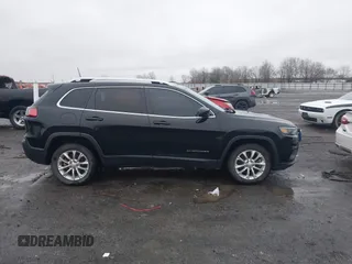 2019 Jeep Cherokee Latitude with VIN 1C4PJLCB1KD339906, listed as a IAAI auction lot 41539248 with 123,243 mi miles and . Bid and sale history available at carsss.com. Image 14.