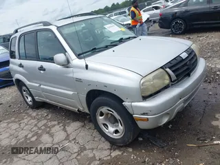 2002 Suzuki Grand Vitara JS with VIN JS3TE62V424153116, listed as a IAAI auction lot 42450459 with 304,622 mi miles and . Bid and sale history available at DreamBid. Image 1.