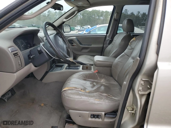 2004 Jeep Grand Cherokee Laredo with VIN 1J4GX48S84C263276, listed as a Copart auction lot 50401355 with 269,019 mi miles and Salvage Title. Bid and sale history available at carsss.com. Image 7.
