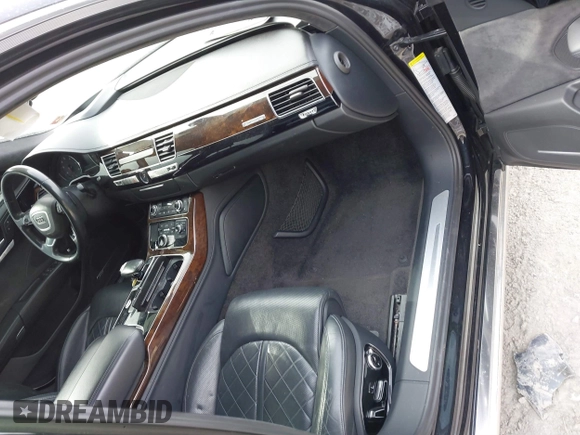 2015 Audi A8 L 4.0T with VIN WAU32AFD7FN006233, listed as a IAAI auction lot 41353034 with 119,693 mi miles. Bid and sale history available at carsss.com. Image 5.