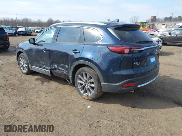 2021 Mazda CX-9 Grand Touring with VIN JM3TCBDY7M0540359, listed as a IAAI auction lot 41711366 with 47,391 mi miles and . Bid and sale history available at carsss.com. Image 3.