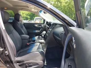 2015 Infiniti QX70 with VIN JN8CS1MW1FM482625, listed as a IAAI auction lot 42332365 with 88,912 mi miles and . Bid and sale history available at DreamBid. Image 5.