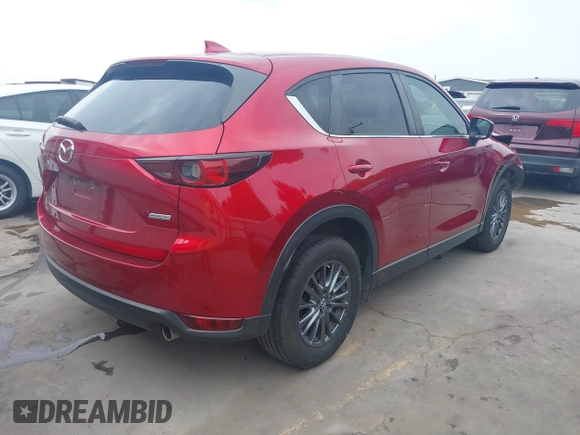 2019 Mazda CX-5 Touring with VIN JM3KFACM7K0696815, listed as a IAAI auction lot 41921763 with 46,900 mi miles. Bid and sale history available at carsss.com. Image 4.