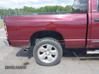 2002 Dodge 1500 with VIN 3D7HU18N52G148095, listed as a IAAI auction lot 42134042 with 180,369 mi miles. Bid and sale history available at carsss.com. Image 6.