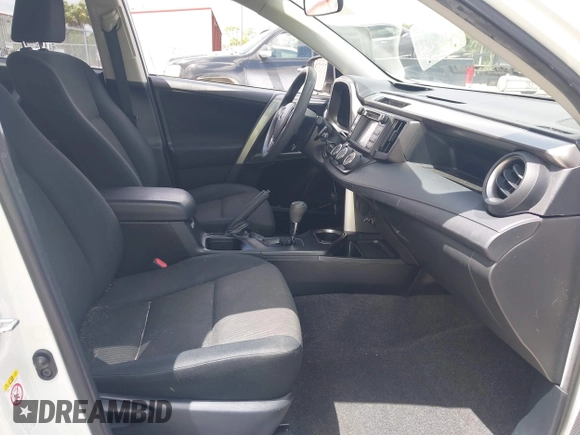 2016 Toyota RAV4 LE with VIN JTMZFREV2GJ096782, listed as a IAAI auction lot 41945319 with 76,866 mi miles. Bid and sale history available at carsss.com. Image 5.